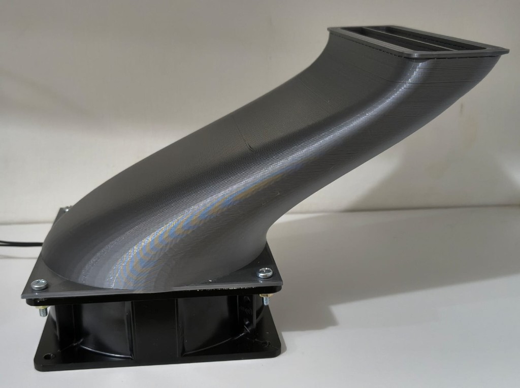 Fan with curved duct mounted