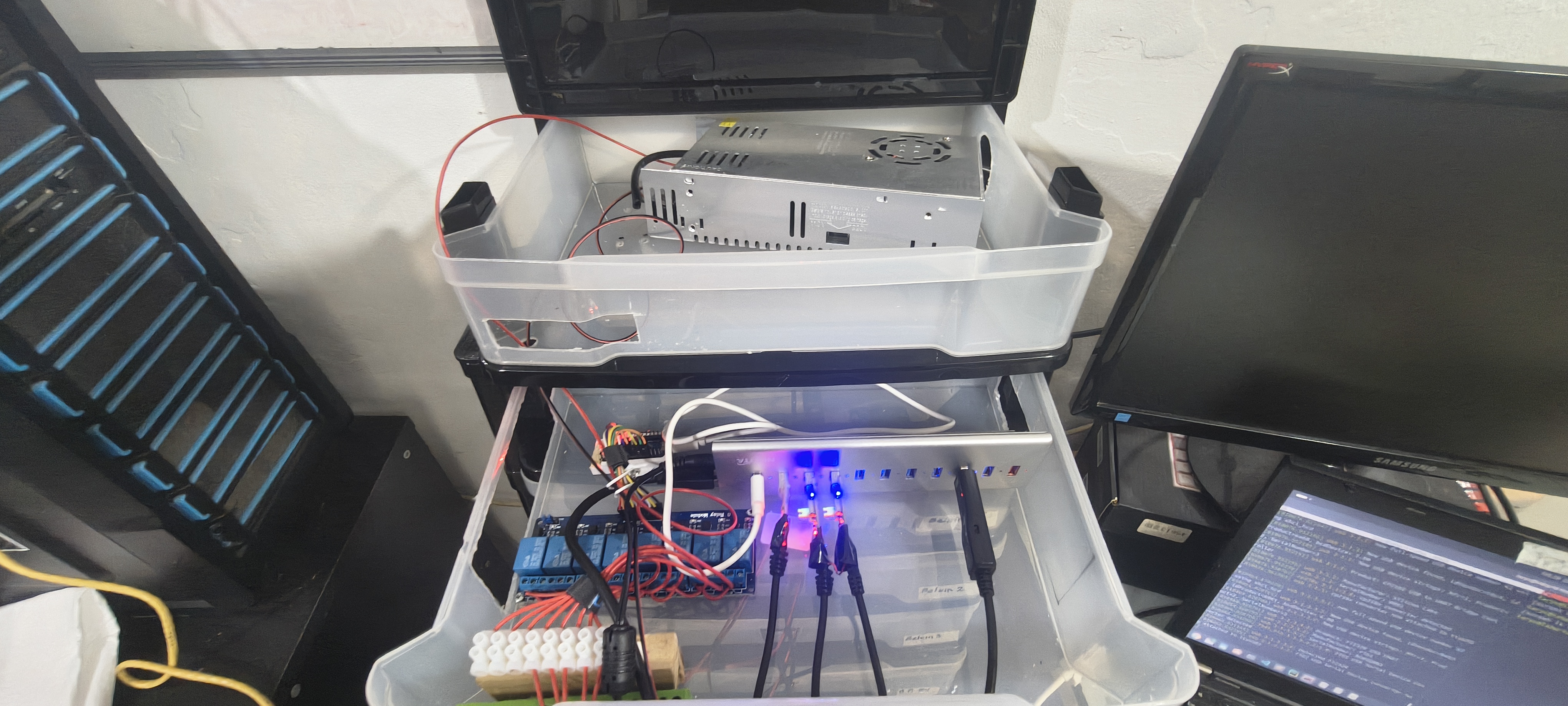 Two rack levels open with PSU and wiring
